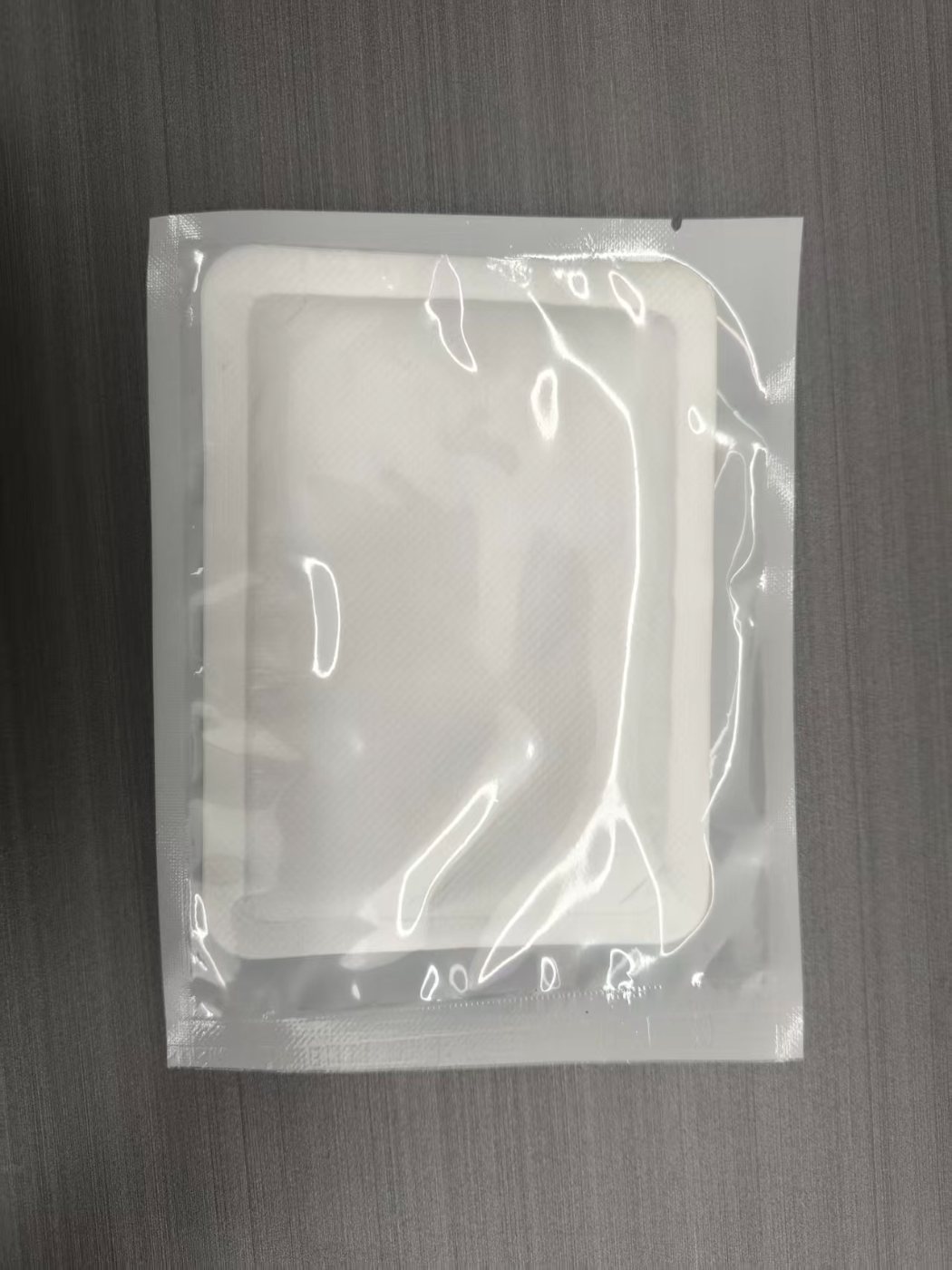 Clear pack front with disposable body warmer